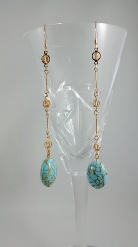 Dangling Gold and Blue colored Earrings