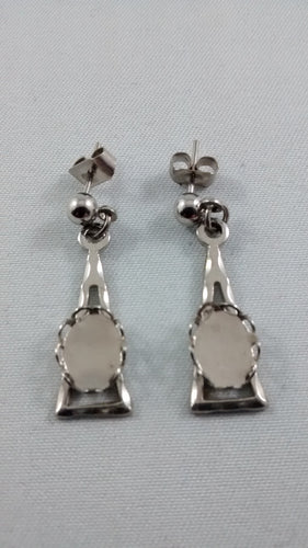 Silver colored pierced earring mounts