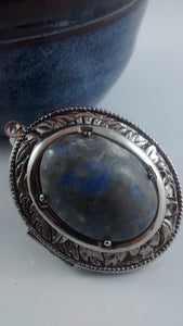 Silver colored Locket Pendant with Blue-Grey Cabochon Centre