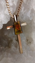 Load image into Gallery viewer, Ammolite stone on large gold colored cross with chain
