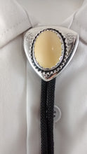 Load image into Gallery viewer, Tagua Nut Bolo Tie with silver colored setting
