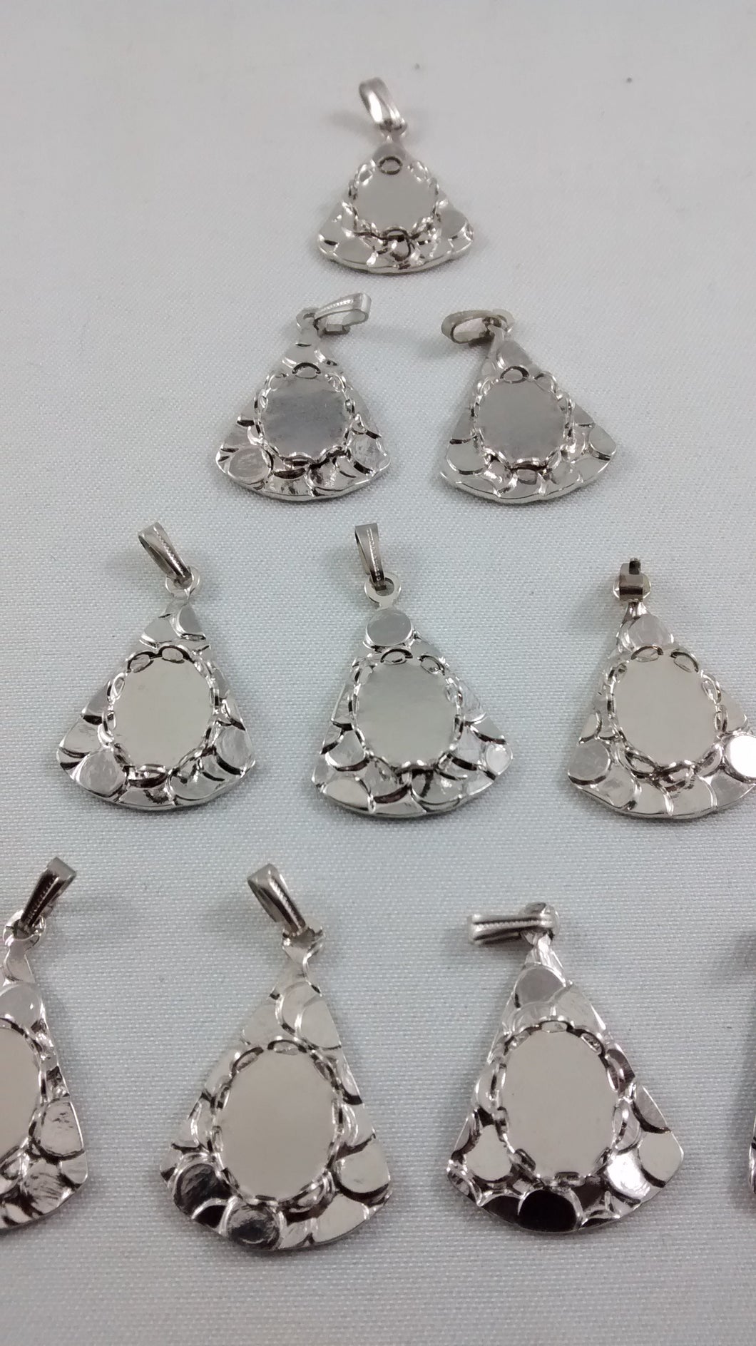 Triangular Shaped Silver Colored Jewelry Mount