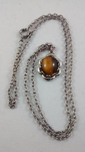 Small Tiger Eye Necklace and silver colored chain