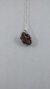 Back of silver and garnet pendant